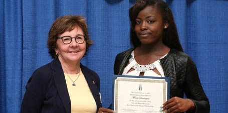 President of the Alumni Association Stu Cubbins with a scholarship recipient